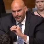 Le sénateur John Fetterman porte un costume et une cravate à l'audience du Sénat du Dr Anthony Fauci sur…