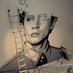 Looksmaxxer, Claviculaire, érige une imposante fresque murale à son effigie dans son penthouse de Miami.
