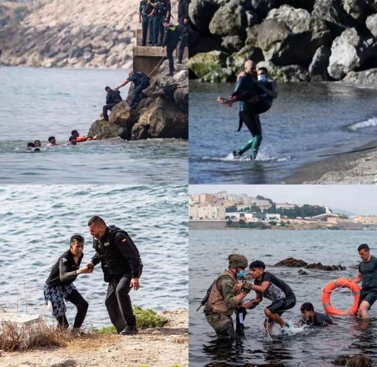 Les gardes-frontières espagnols aident les migrants clandestins à contourner la barrière frontalière de…