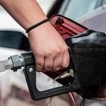 Customer Fueling Passenger Vehicle At Gas Station In Utah