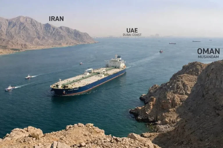 Oil-tanker-passing-through-the-Strait-of-Hormuz-between-Iran-and-Oman-narrow-waterway