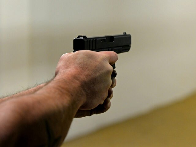 mans-arm-with-hand-pointing-a-gun-640x480 (1)
