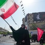 woman-waves-Iranian-flag-Iran-Aug4-26-ap-640x480